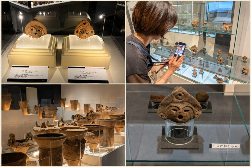 釈迦堂遺跡博物館の展示室。ガラスケースに並ぶ縄文の土偶と土器、人気の土偶「しゃかねちゃん」